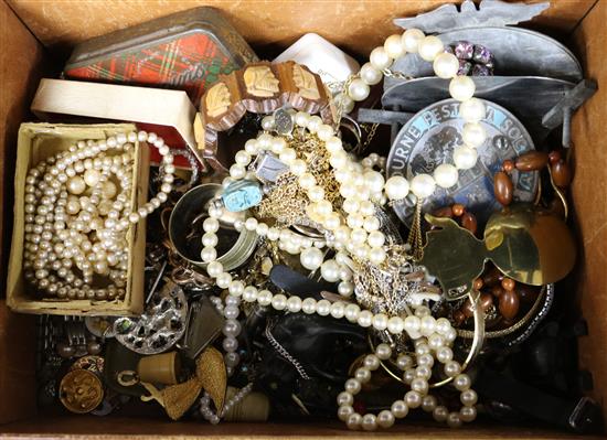 A box of assorted costume jewellery.